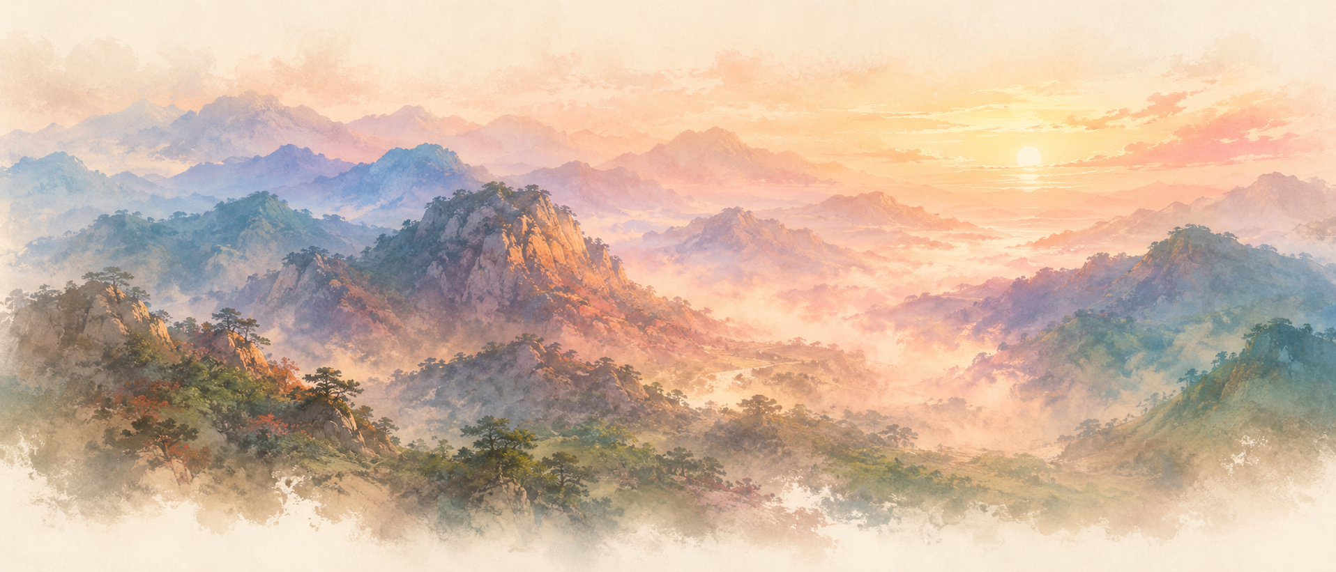 Misty painted mountains under a rising sun